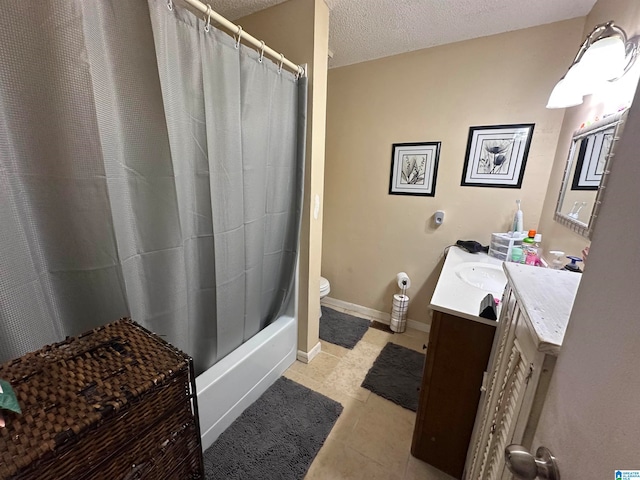 full bathroom featuring shower / bathtub combination with curtain, vanity, a textured ceiling, toilet, and tile patterned floors