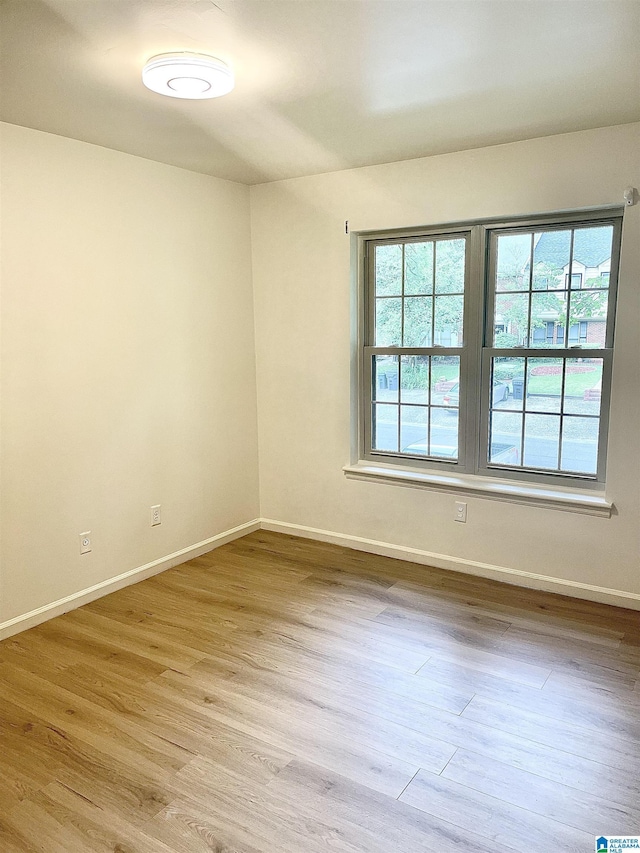 2139 Montreat Dr Unit C, Vestavia Hills, AL 35216 - spare room featuring wood finished floors and baseboards