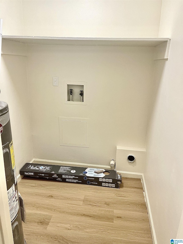 2139 Montreat Dr Unit C, Vestavia Hills, AL 35216 - laundry area with washer hookup, wood finished floors, hookup for an electric dryer, electric water heater, and baseboards