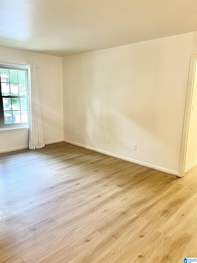 2139 Montreat Dr Unit C, Vestavia Hills, AL 35216 - spare room featuring light wood-style floors and baseboards