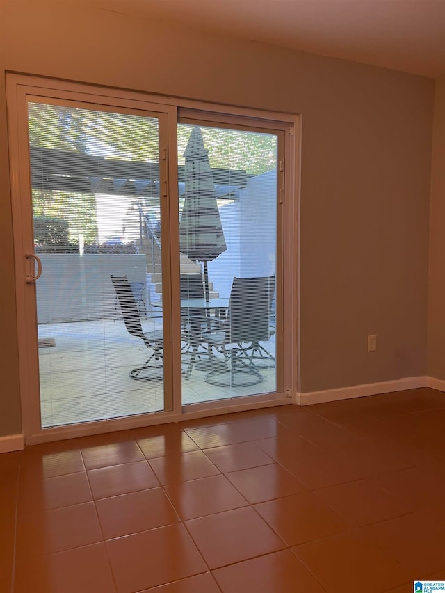 entryway with tile patterned floors