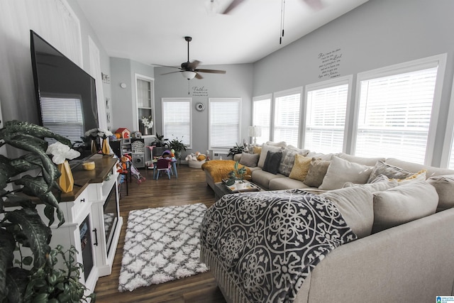 living area with dark wood-type flooring and a ceiling fan