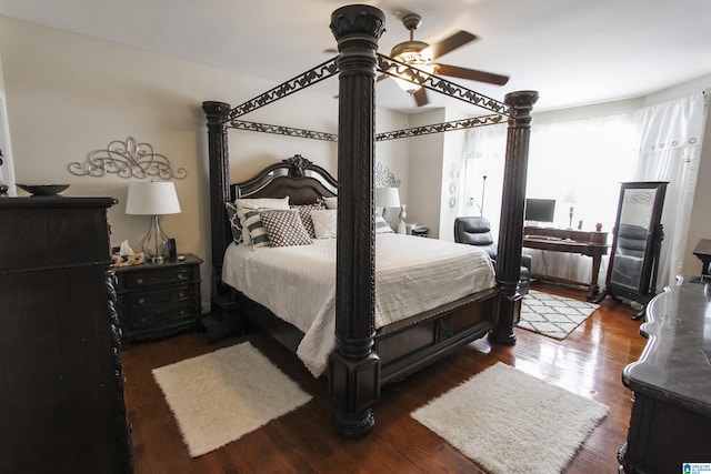 bedroom featuring dark wood-style floors and ceiling fan