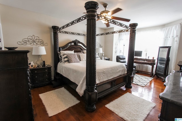 bedroom featuring ceiling fan and dark wood-type flooring