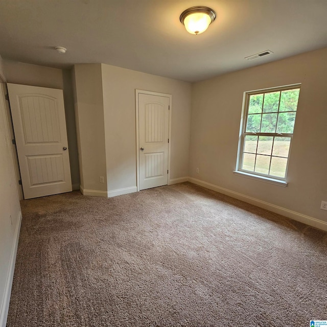 interior space featuring carpet