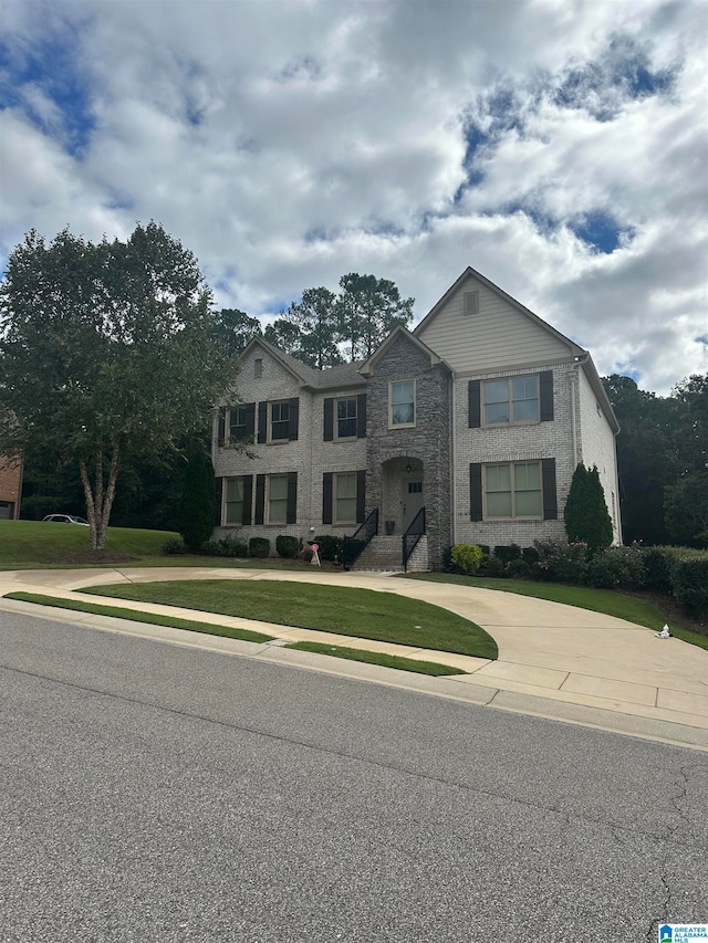 view of front of home with a front yard