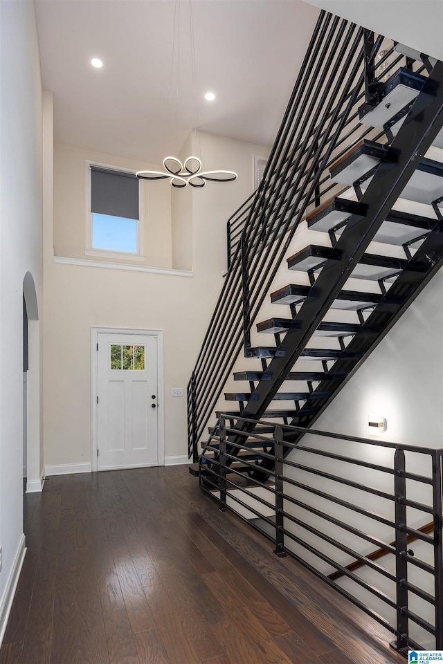 foyer featuring dark wood-type flooring