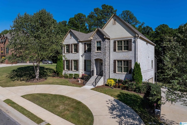 view of front of home with a front lawn