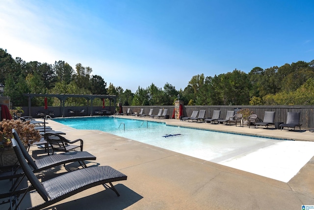 view of pool featuring a patio