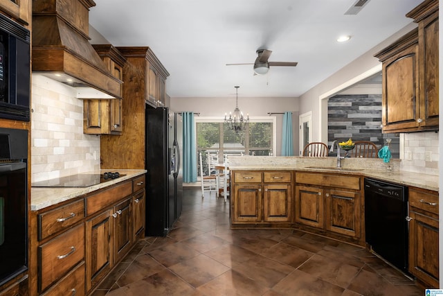 kitchen featuring sink, ceiling fan with notable chandelier, custom range hood, decorative backsplash, and black appliances