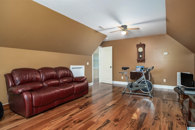 living room with wood-type flooring, vaulted ceiling, and ceiling fan