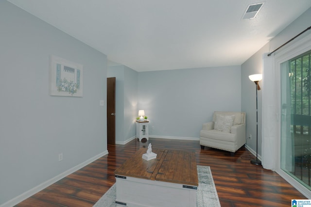 living room featuring dark wood-type flooring