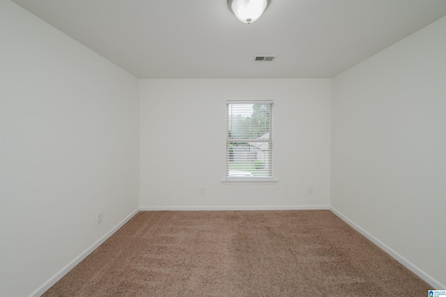 unfurnished room with carpet