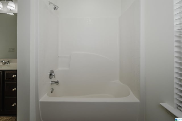 bathroom featuring vanity and bathtub / shower combination