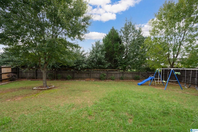 view of yard with a playground