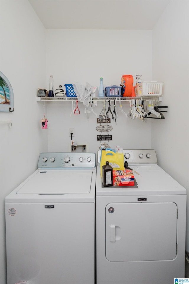 laundry area featuring washing machine and dryer