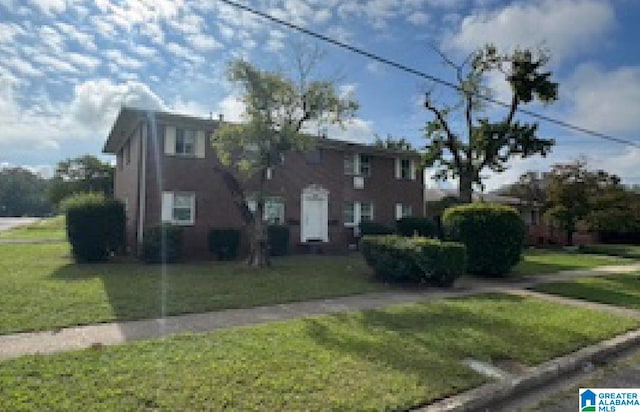 view of front of house with a front yard