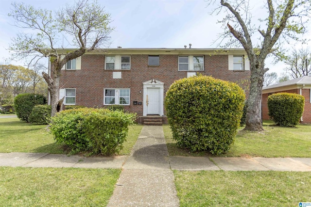 7749 5th Ave, Birmingham, AL 35206 - view of front of home featuring brick siding and a front lawn