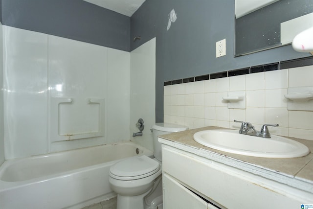 7749 5th Ave, Birmingham, AL 35206 - bathroom with toilet, decorative backsplash, shower / tub combination, and vanity