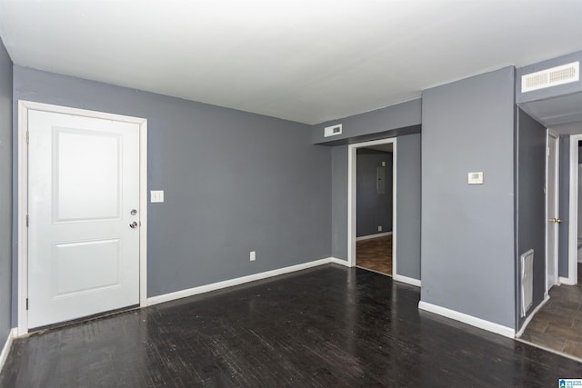 7749 5th Ave, Birmingham, AL 35206 - spare room with wood finished floors and baseboards