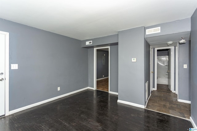 7749 5th Ave, Birmingham, AL 35206 - unfurnished bedroom with baseboards and wood finished floors