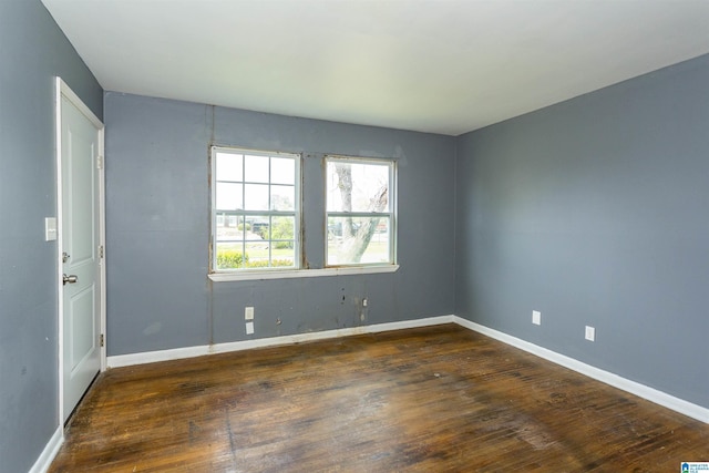 7749 5th Ave, Birmingham, AL 35206 - unfurnished room featuring hardwood / wood-style flooring and baseboards