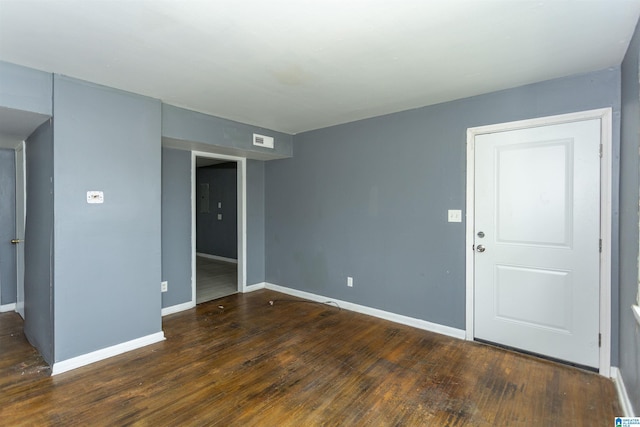 7749 5th Ave, Birmingham, AL 35206 - unfurnished room with baseboards and wood finished floors