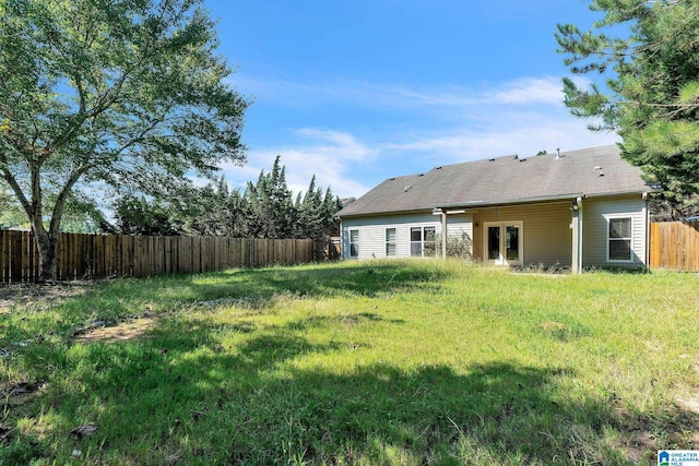 view of yard featuring a fenced backyard