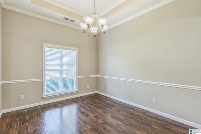 empty room featuring dark wood-style floors, a notable chandelier, and visible vents