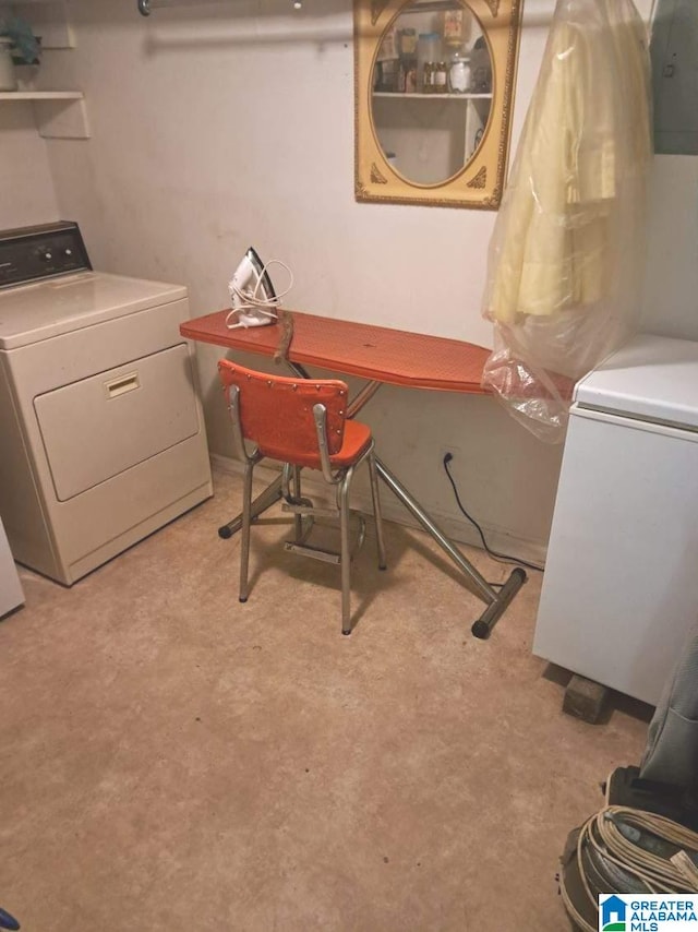 clothes washing area featuring washer / dryer