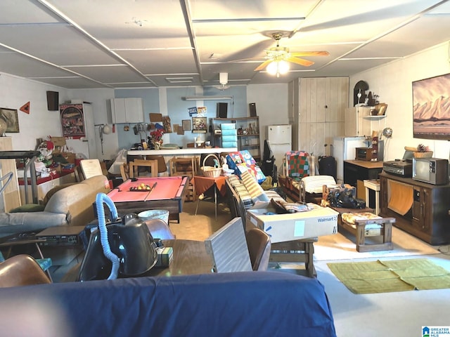 living room with ceiling fan and billiards