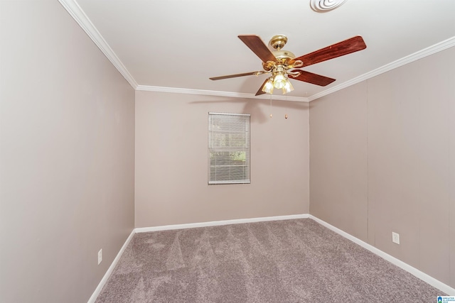 carpeted spare room featuring ornamental molding and ceiling fan