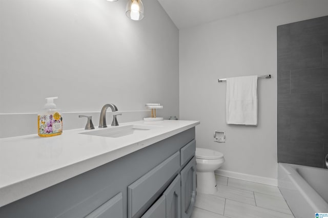 bathroom with vanity, toilet, and tile patterned floors