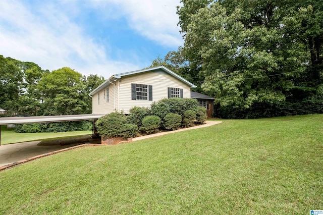 view of property exterior featuring a yard