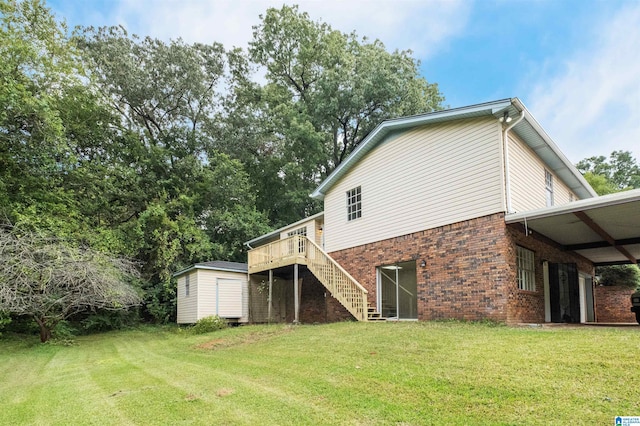 exterior space with a yard and a deck