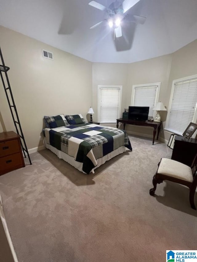 carpeted bedroom featuring ceiling fan