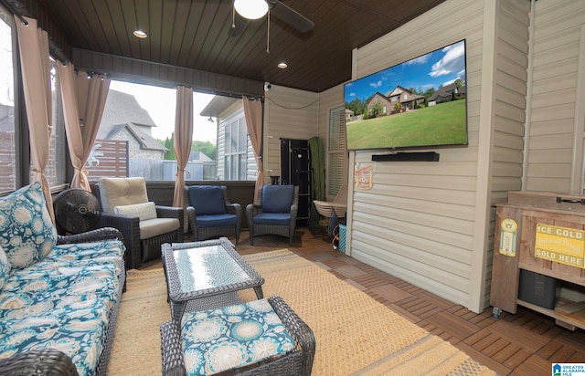 exterior space with ceiling fan and an outdoor hangout area