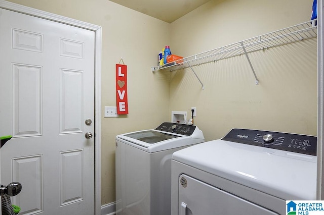 laundry area featuring washer and clothes dryer