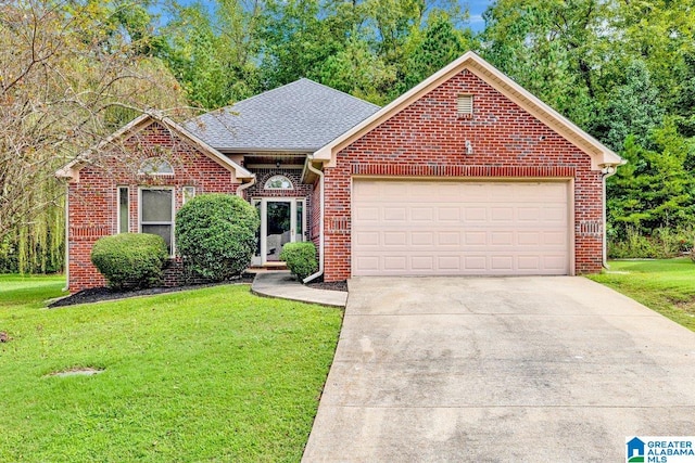 front facade with a front lawn and a garage