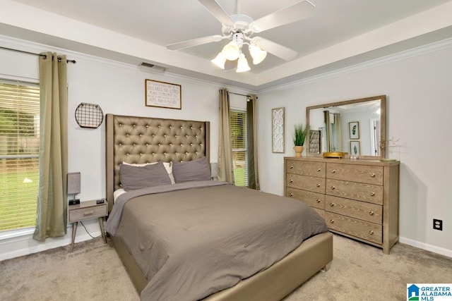 bedroom featuring ceiling fan, light carpet, and ornamental molding