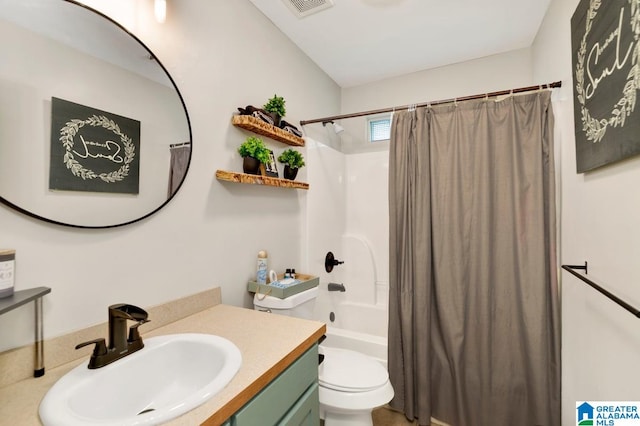 full bathroom with shower / bath combo with shower curtain, vanity, and toilet