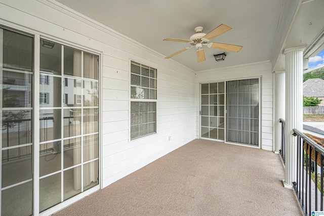 balcony featuring ceiling fan