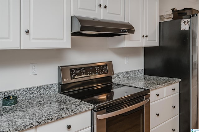 kitchen featuring light stone countertops, appliances with stainless steel finishes, and white cabinetry