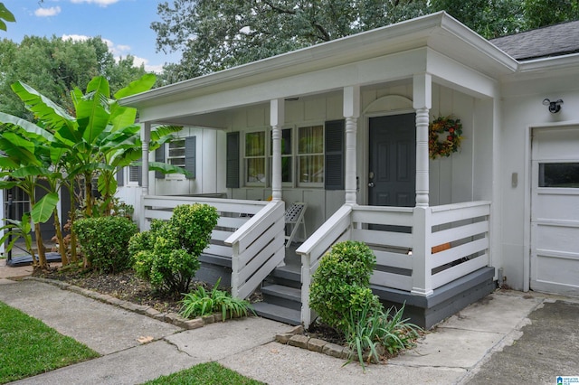 entrance to property with covered porch