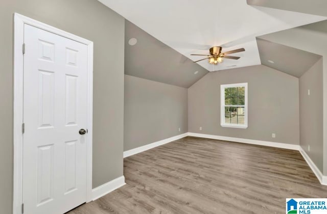 bonus room with ceiling fan, lofted ceiling, and light hardwood / wood-style floors