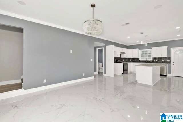 kitchen with pendant lighting, a kitchen island, white cabinetry, an inviting chandelier, and stainless steel electric range oven