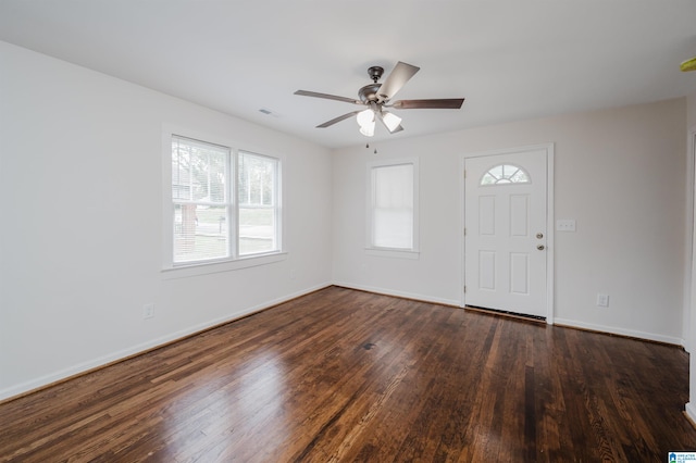 foyer entrance featuring dark hardwood / wood-style floors and ceiling fan