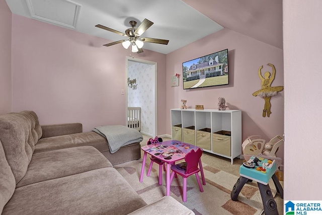 carpeted living room featuring ceiling fan