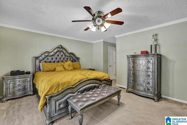 bedroom featuring a textured ceiling, carpet, crown molding, and ceiling fan