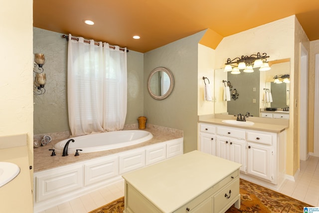 full bath featuring tile patterned floors, a bath, recessed lighting, and vanity
